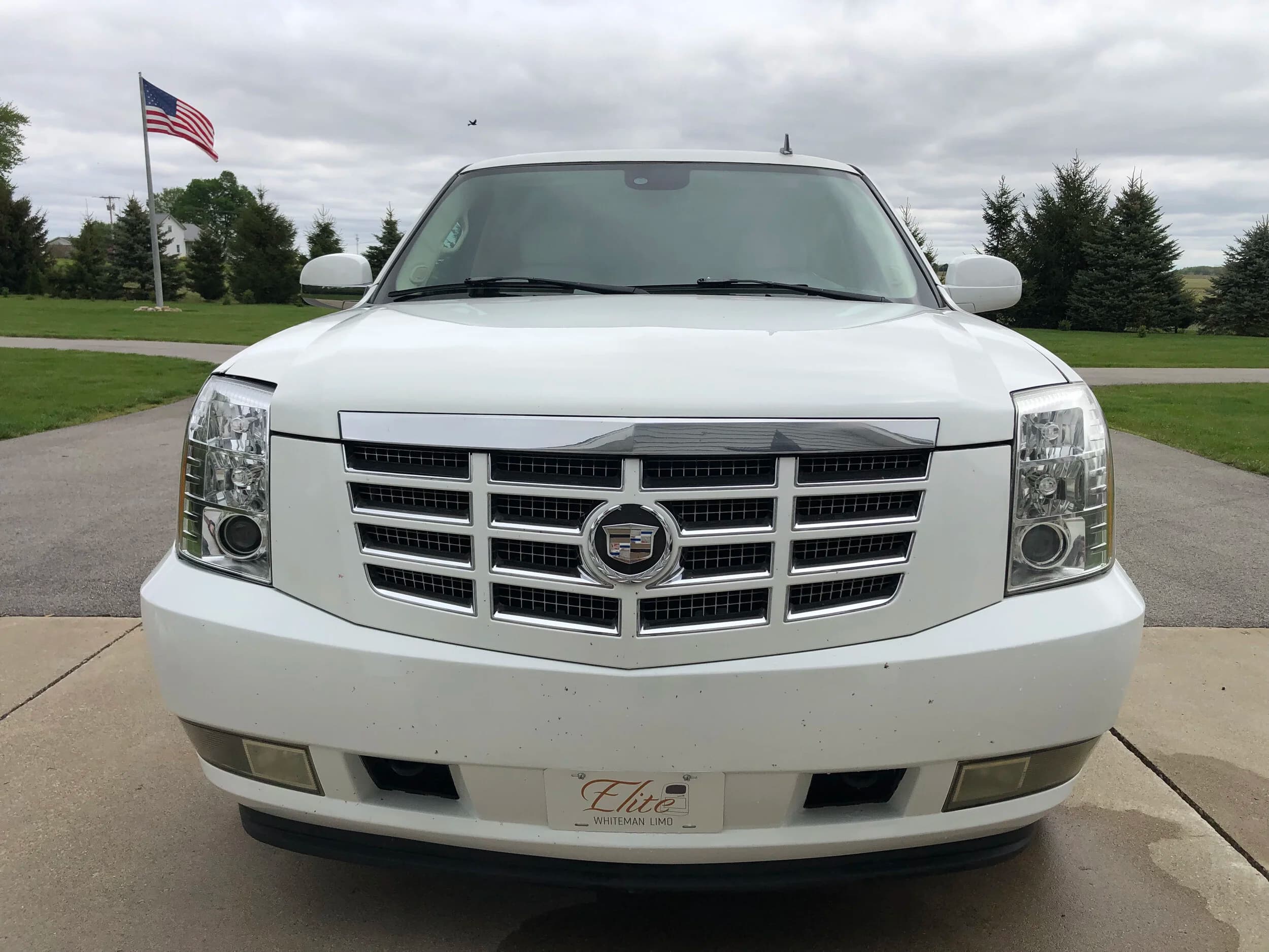Woodie Cadillac Escalade stretch limousine front view