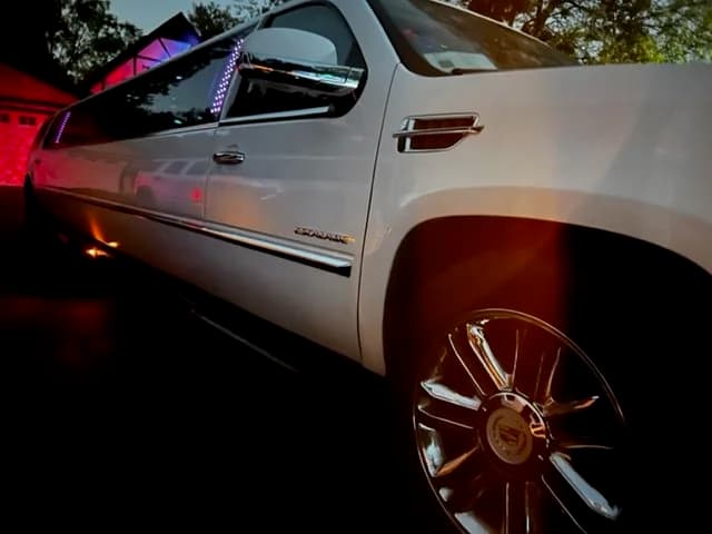 Partyin' Cadillac Escalade stretch limousine exterior